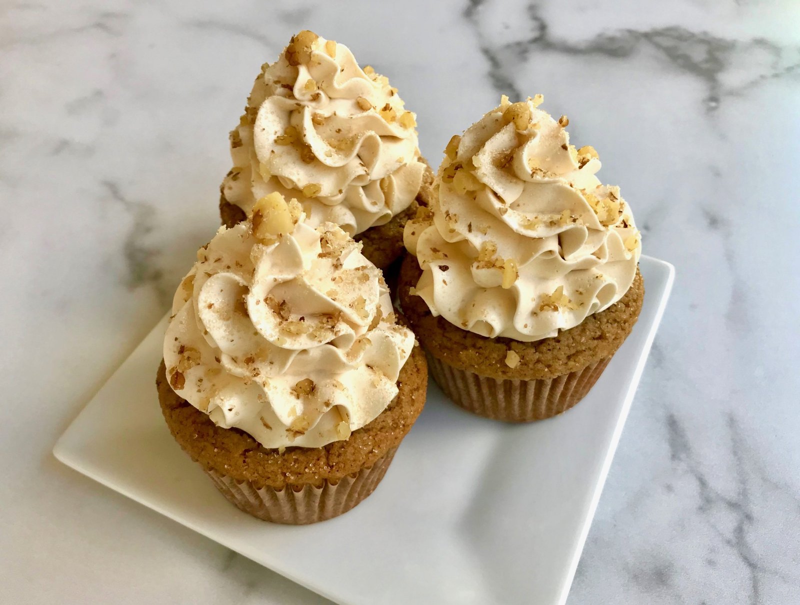Keto Pumpkin Spice Cupcakes with Walnuts and Vanilla Buttercream Frosting